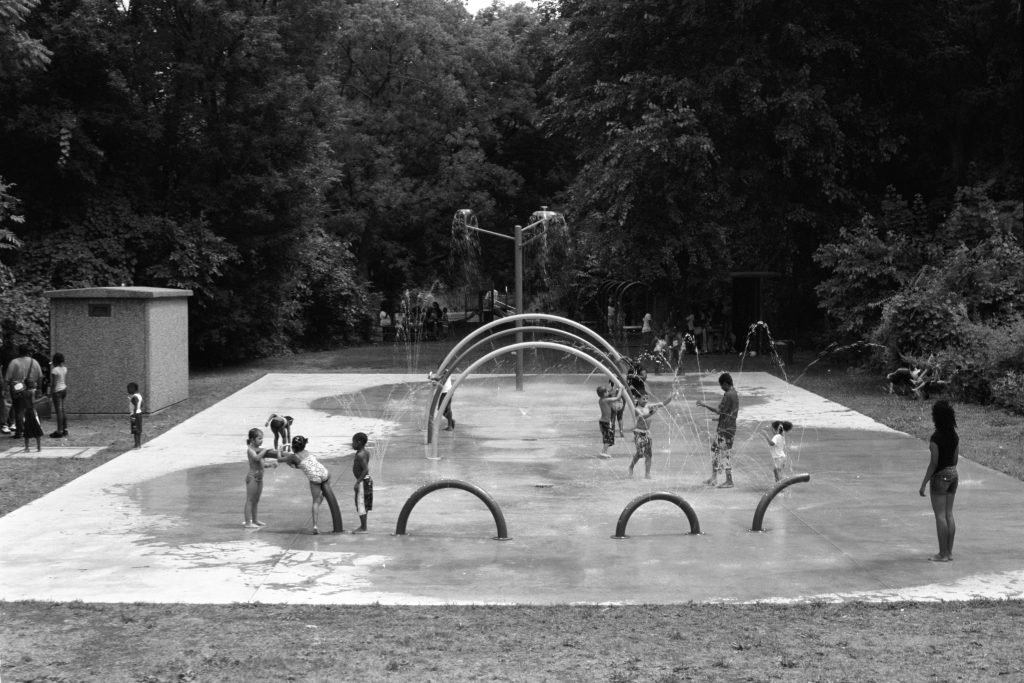 2009: Children play in Sheridan Hollow Splash Park, an environmental amenity drawing summer crowds.