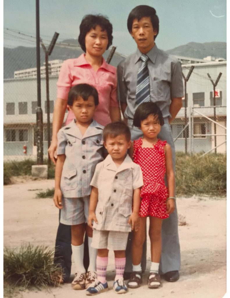 Say Tang with her family at the Hong Kong Refugee Camp. She resides in Oxnard, CA.