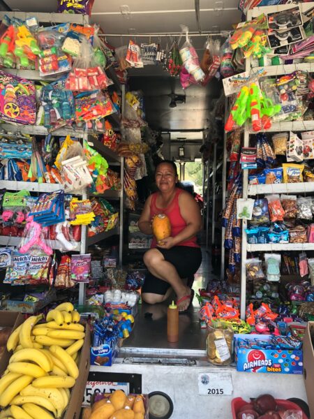 2019: Vendor sells fresh fruits and vegetables in Panorama City