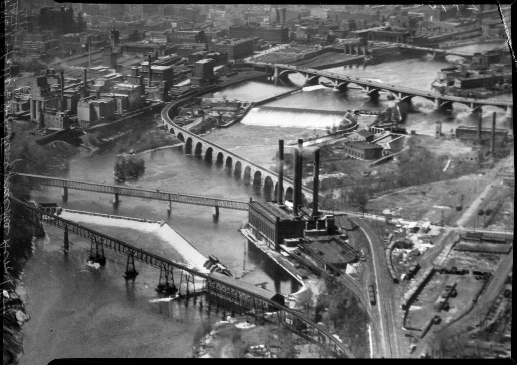 1934: Aerial View of post-dam construction at Saint Anthony Falls.