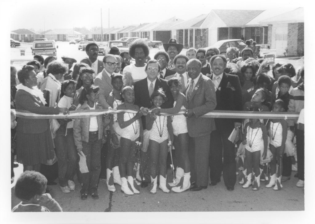 Ca. 1981: Gordon Plaza residents, Mayor Ernest N. Morial (center) and city council people.